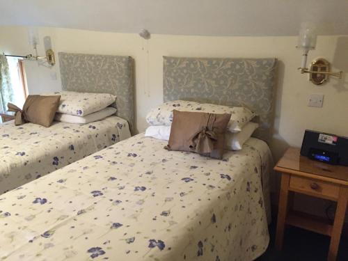 A bed or beds in a room at Lowe Farm 