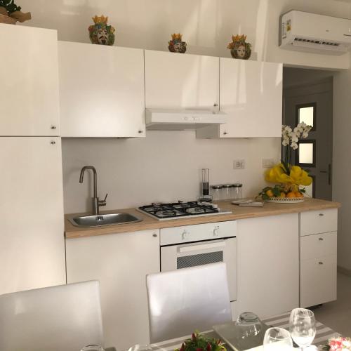 Kuchyň nebo kuchyňský kout v ubytování GiorGiada Luxury
