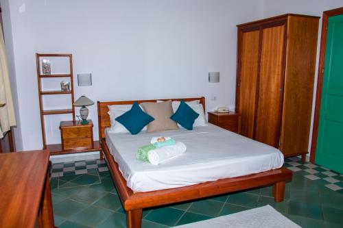 Postel nebo postele na pokoji v ubytování Guardia dei Mori