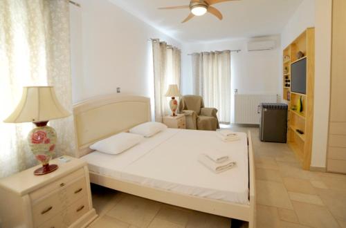 Ένα ή περισσότερα κρεβάτια σε δωμάτιο στο Villa Busho