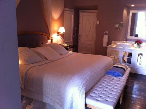 Katil atau katil-katil dalam bilik di Hotel Valdepalacios Gourmand 5* GL
