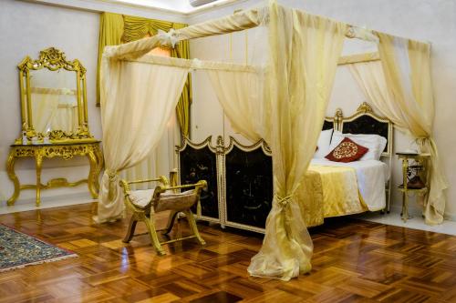 Postel nebo postele na pokoji v ubytování Grand Hotel Osman Ristorante il Danubio