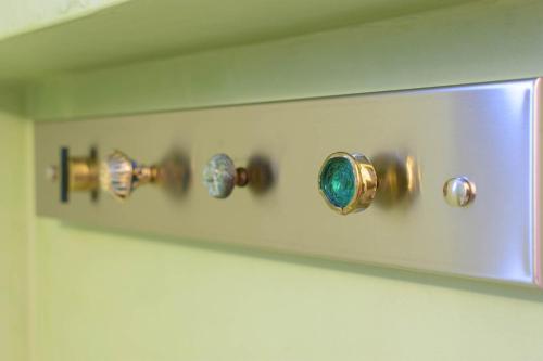 a door handle with four different types of glass at Villa Sophia in Agios Nikolaos