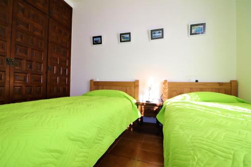 Ένα ή περισσότερα κρεβάτια σε δωμάτιο στο Les Teules 3B Roses - Immo Barneda