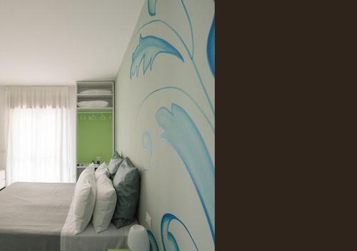 Letto o letti in una camera di Oikos Selinunte Guest House