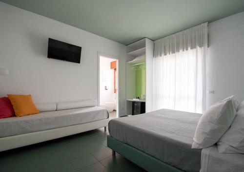 Letto o letti in una camera di Oikos Selinunte Guest House