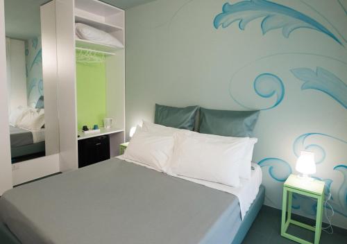 Letto o letti in una camera di Oikos Selinunte Guest House