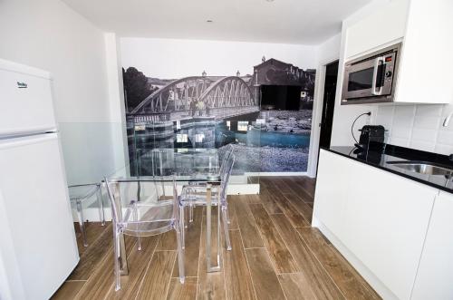 Dapur atau dapur kecil di Fuente Torán Apartamentos