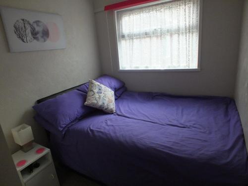 Katil atau katil-katil dalam bilik di Broadside Chalet Park