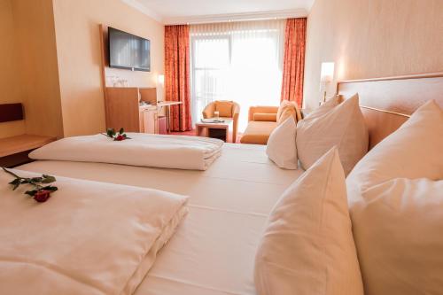 Hotel an der Linah garniにあるベッド