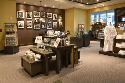 a clothing store with displays of items on display at The Guest House at Graceland in Memphis