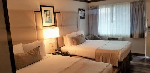 Katil atau katil-katil dalam bilik di The Dalles Inn