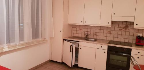 A kitchen or kitchenette at Apartment Littau