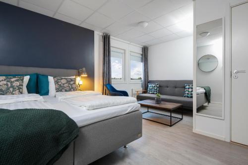 Postel nebo postele na pokoji v ubytování Hotel Vindeus