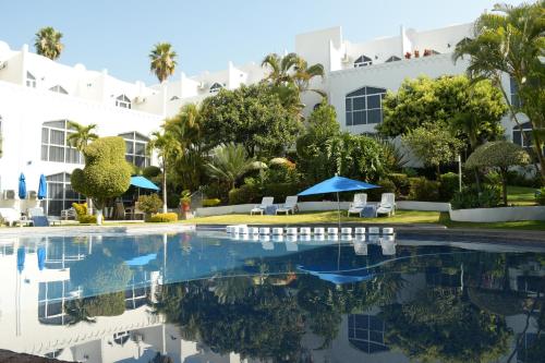 a view of the hotel from the pool at Villa Bejar Cuernavaca in Cuernavaca