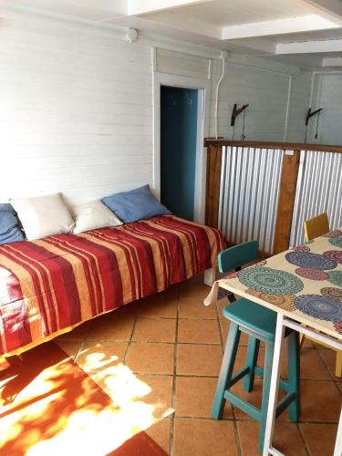 Llit o llits en una habitació de El Tamarisco