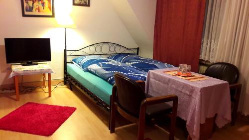 Ένα ή περισσότερα κρεβάτια σε δωμάτιο στο Hotel garni Am Hochwald