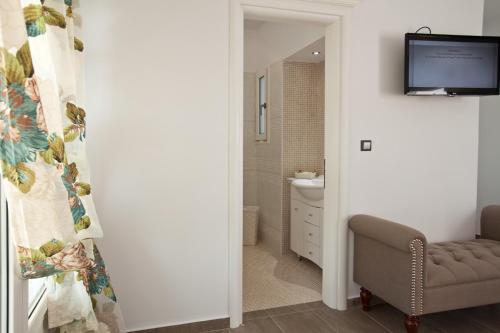 Un baño de Miland Suites