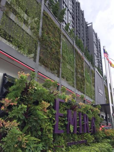 a building with plants on the side of it at Emira Residence Sek 13 Shah Alam Wi-Fi Netflix in Shah Alam