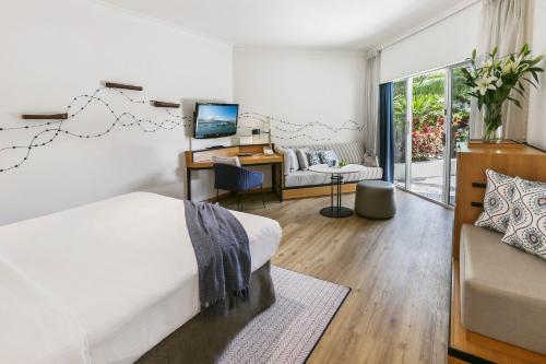 Televiisor ja/või meelelahutuskeskus majutusasutuses Shangri-La The Marina, Cairns
