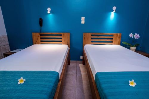 Postel nebo postele na pokoji v ubytování Hotel Cap Sud