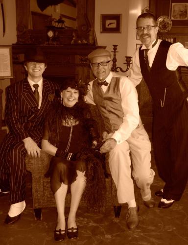 an old photo of a group of people posing for a picture at Hotel Töyrylä Manor in Artjärvi