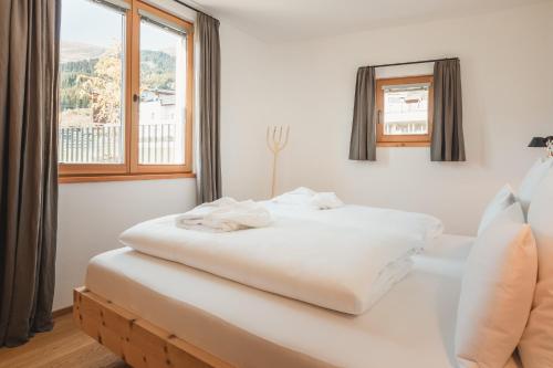 Postel nebo postele na pokoji v ubytování Chesa Muntanella