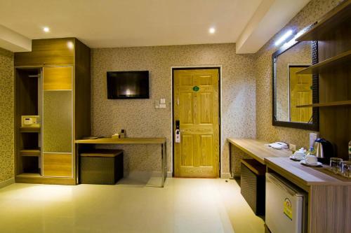 Kuchyň nebo kuchyňský kout v ubytování Roseate Chiang Mai