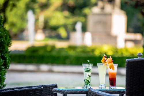 a table with two drinks on top at Hemus Hotel - Vratza in Vratsa