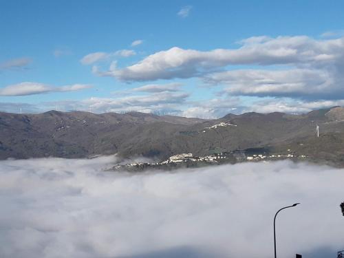a view of a foggy valley with mountains at Locazione Turistica Arcobaleno "Appartamento Superior" in Roccavivara