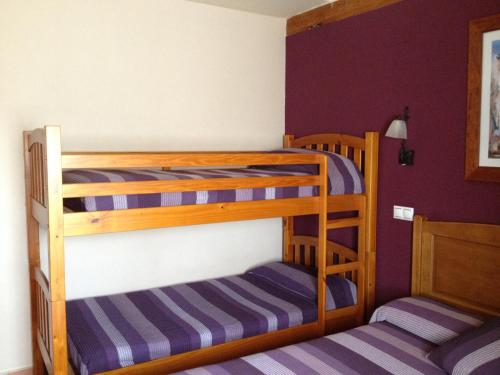 Ένα ή περισσότερα κρεβάτια σε δωμάτιο στο Hosteria San Emeterio