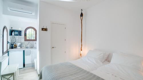 Katil atau katil-katil dalam bilik di Mijas Residence
