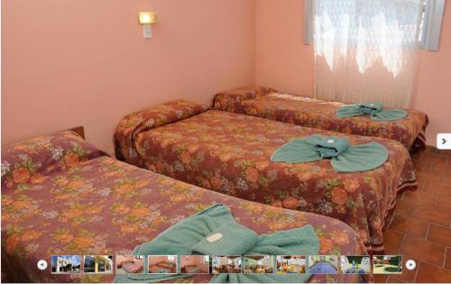 Katil atau katil-katil dalam bilik di Hotel Arco Iris