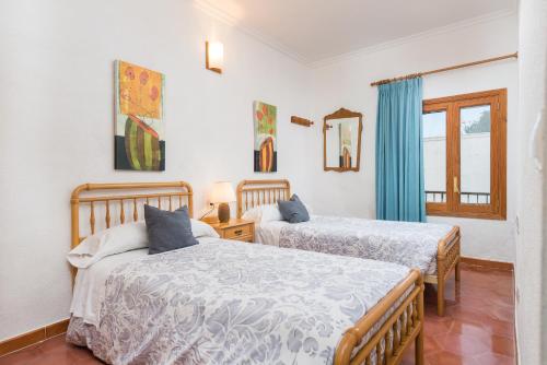 Katil atau katil-katil dalam bilik di CASA SA MARINA en Alcudia