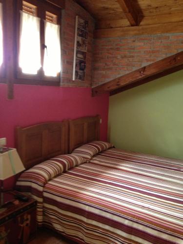 Ένα ή περισσότερα κρεβάτια σε δωμάτιο στο Hosteria San Emeterio