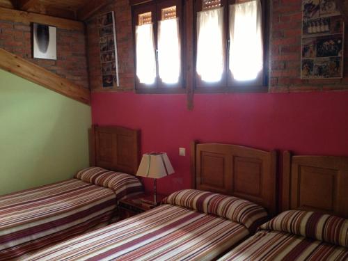 Ένα ή περισσότερα κρεβάτια σε δωμάτιο στο Hosteria San Emeterio