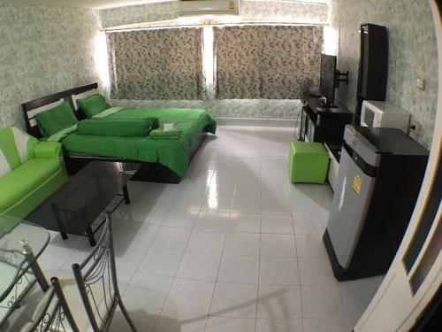 Letto o letti in una camera di อิมแพ็ค เมืองทองธานี ห้องเช่ารายวัน เมืองทอง popular condo C5