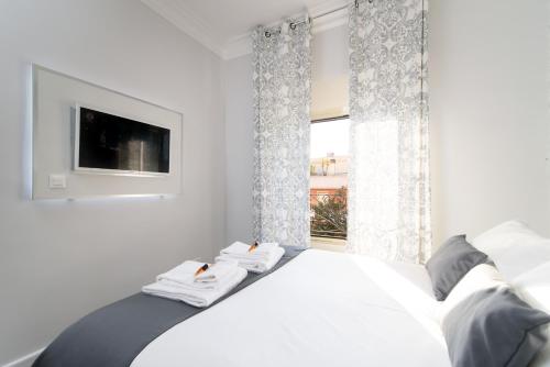 Postel nebo postele na pokoji v ubytování White Caesar Guesthouse
