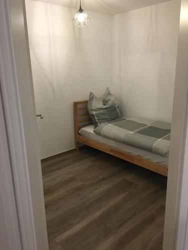 Katil atau katil-katil dalam bilik di Ferienwohnungen Weiherhausstraße 6