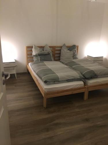 Katil atau katil-katil dalam bilik di Ferienwohnungen Weiherhausstraße 6