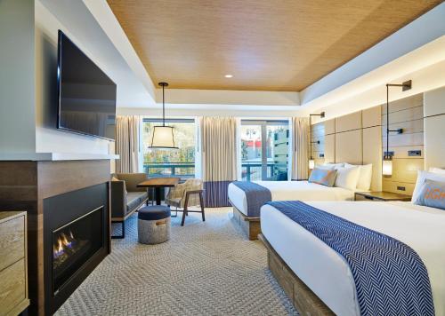 Postel nebo postele na pokoji v ubytování Limelight Hotel Snowmass