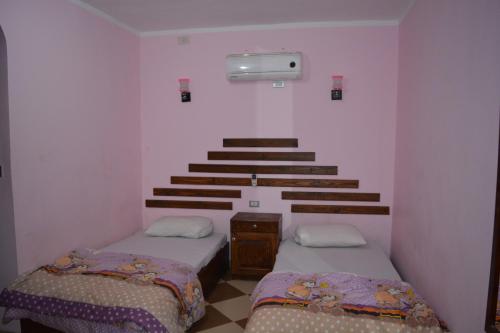 Cama o camas de una habitación en Oasis Fighting Kangaroo