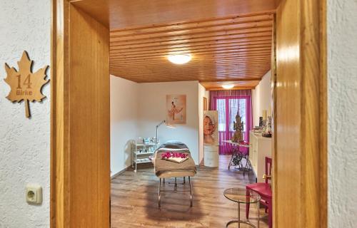 Zona de estar de Hotel der Bäume
