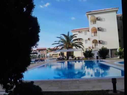 a large swimming pool in front of a building at Sunrise Beach Club (Hera B6@) in Kalecik