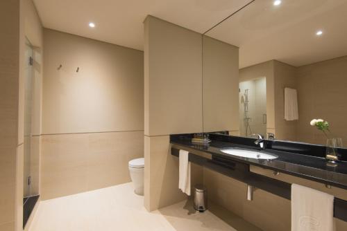 a bathroom with a sink and a toilet at Vila Gale Collection Sintra in Sintra