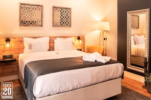 Uma cama ou camas num quarto em Porta 20 Boutique Guesthouse