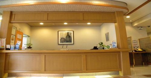 a lobby with a cash counter in a building at Hotel Benex Yonezawa / Vacation STAY 14346 in Yonezawa