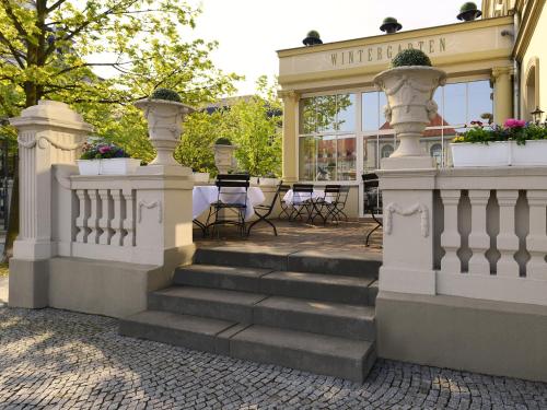 a set of stairs leading up to a building at Hotel Kaiserin Augusta in Weimar