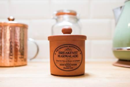 a bottle of peanut butter sitting on a table at Providence Cottage a Sussex boutique retreat for two in Angmering