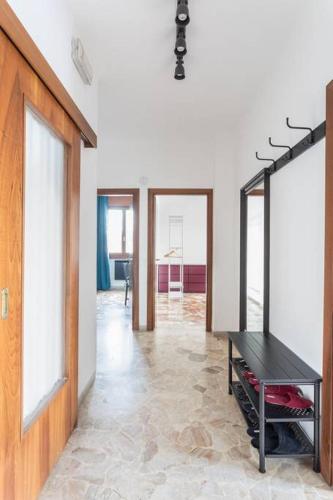 a room with a ping pong table and mirrors at La Serenissima - 15 min to Venice City Center - Free Parking in Campalto